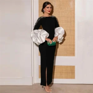 Modelo Aruma.Vestido Negro de Fiesta con Mangas Globo de Satén y Pedrería – Elegancia de Alta Costura